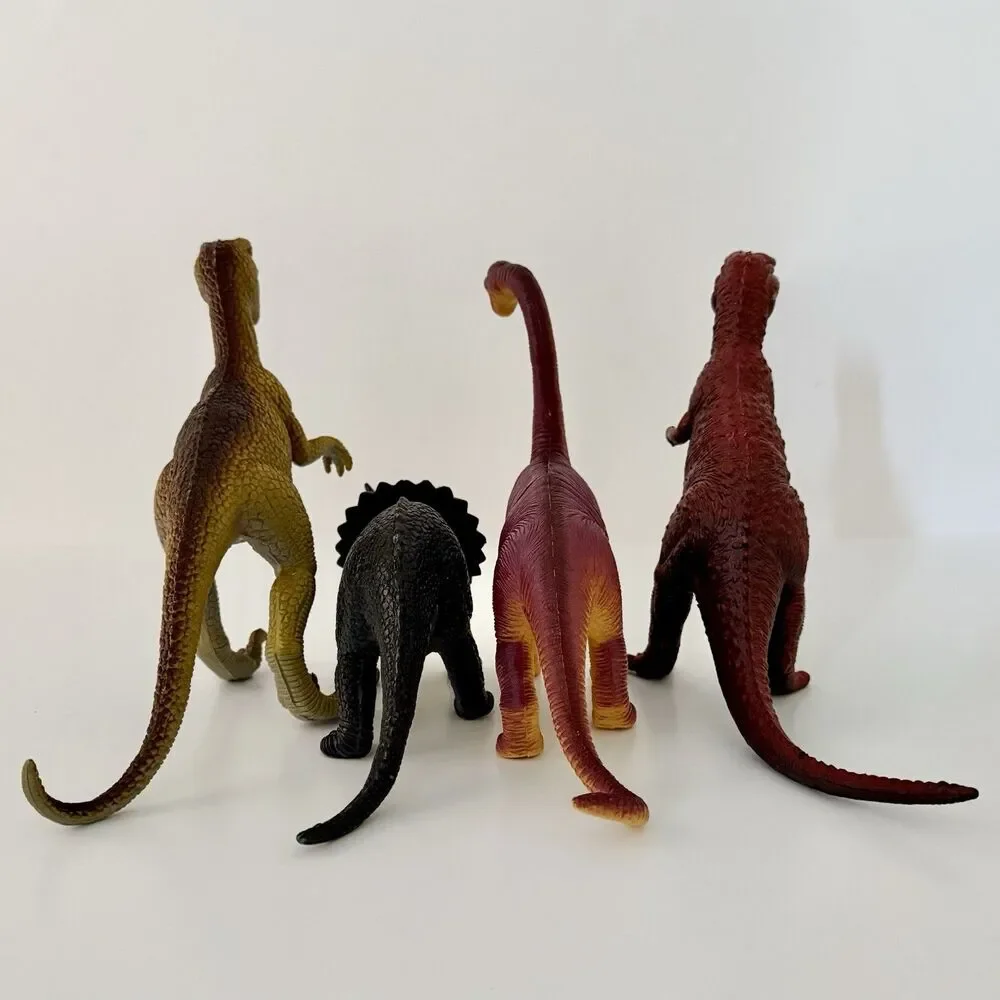 Lot of 4 Vintage Assorted Dinosaurs Plastic/Rubber Embossed - Up to 8.5